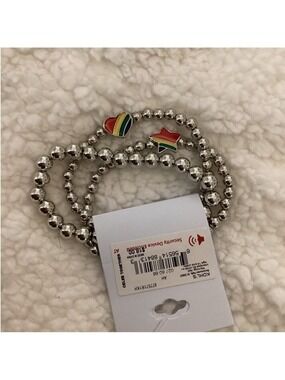 Celebrate Together Pride themed silver beaded stretch bracelets